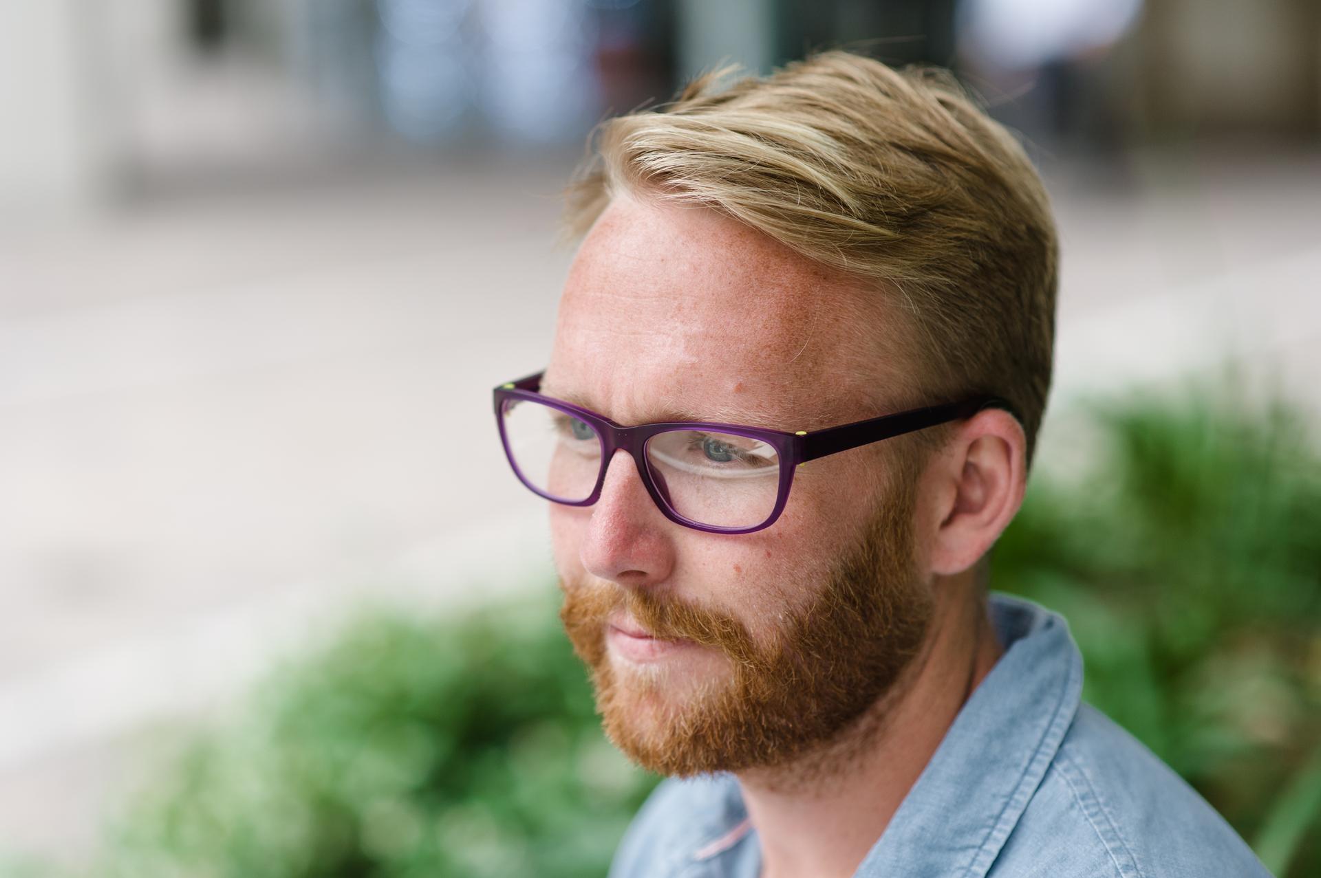 Close-up of a dad in Dresden Vision New Zealand frames, highlighting durable eyewear that supports long-term eye health.