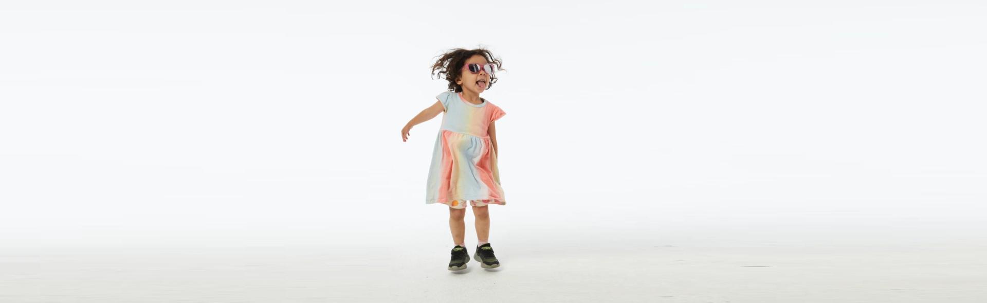 A playful child sporting Dresden Vision New Zealand’s kids glasses, crafted for all-day wear. Discover durable and lightweight childrens eyewear with high-quality lenses in New Zealand.