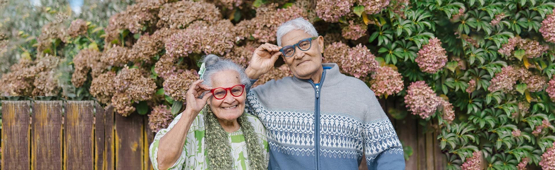 Elderly couple wearing stylish glasses, showcasing Dresden Vision Australias comfortable, durable, and affordable Australian-made eyewear designed for seniors.