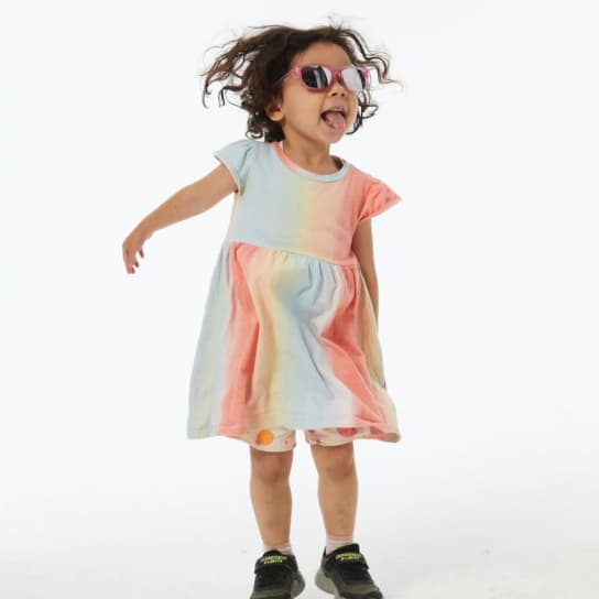 A playful child sporting Dresden Vision New Zealands kids glasses, crafted for all-day wear. Discover durable and lightweight childrens eyewear with high-quality lenses in New Zealand.