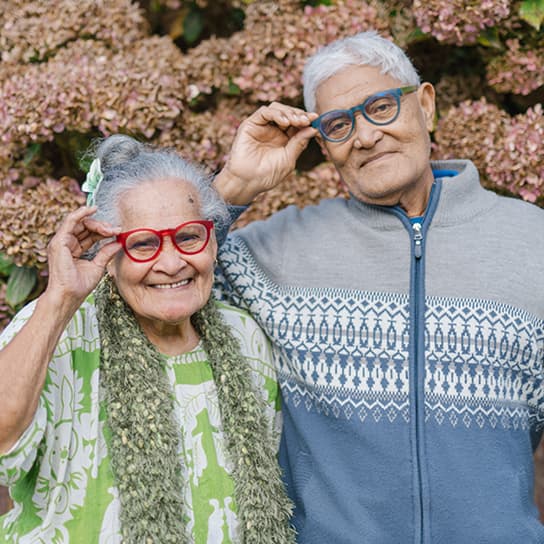 Old couple in stylish glasses, showing Dresden Vision commitment to comfortable, long-lasting, and budget-friendly Australian-made eyewear for elderly adults.